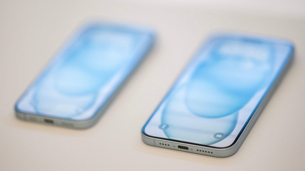 The new Apple iPhone 15 Pro, with EU ordered USB-C charger, is displayed amongst other new products during a launch event at Apple Park in Cupertino, California, on September 12, 2023. 