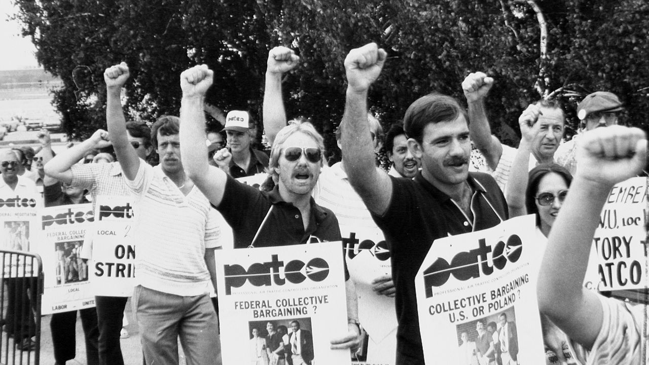 Air traffic controllers walk the picket line at the airport during the 1981 strike.