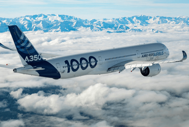 This image shows a picture of an Airbus A350 airplane during a test flight.