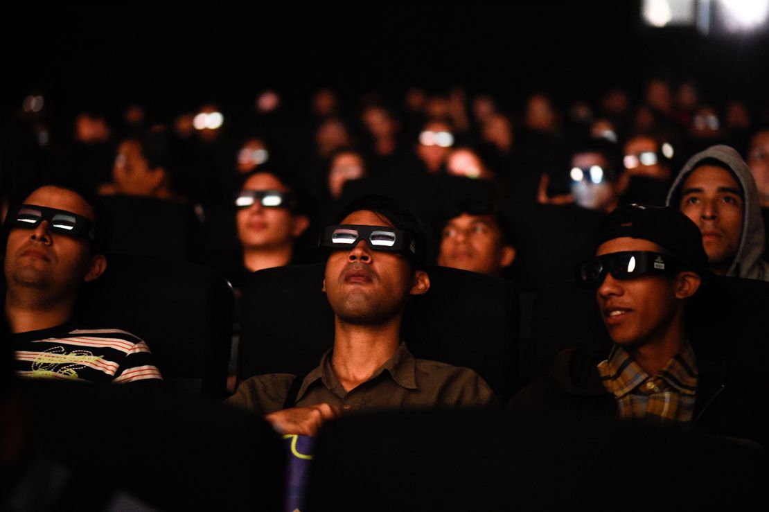 Venezuelan filmgoers watch the first screening in Venezuela of Marvel Studios' 